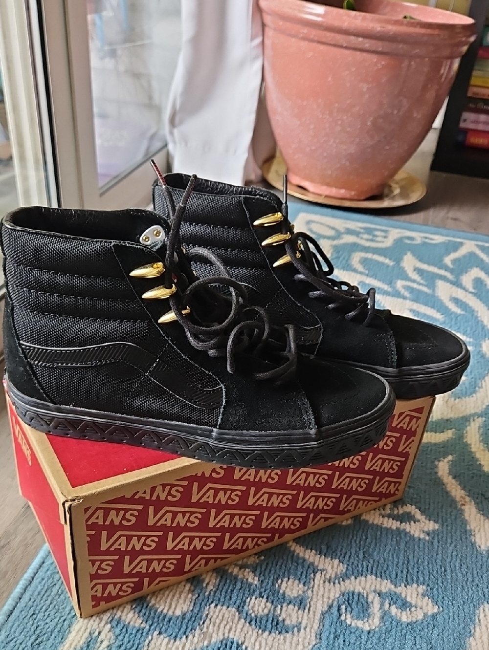 Vans Black High-Top Sneakers with Gold Eyelets